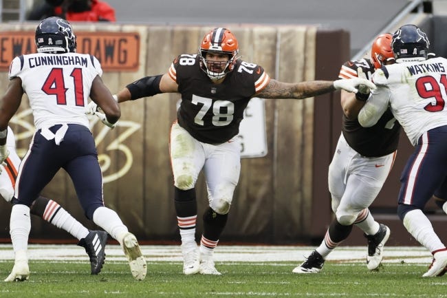 Cleveland Browns offensive tackle Jack Conklin (78) plays against the Houston Texans during the second half of an NFL football game, Sunday, Nov. 15, 2020, in Cleveland. The Cleveland Browns were forced to place three more players, including starting right tackle Jack Conklin and kicker Cody Parkey, on the COVID-19 list Wednesday, Nov. 18, 2020, as they prepare for this week's home game against Philadelphia.(AP Photo/Ron Schwane)