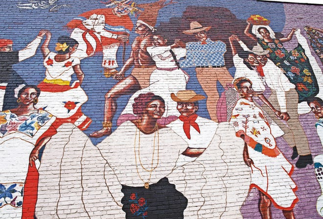 El Baile de la Vida, or “The Dance of Life,” is a part of the downtown Avenue of Murals project, and a tribute to Mexican folklorico dancing. [VISITKANSASCITYKS.COM]