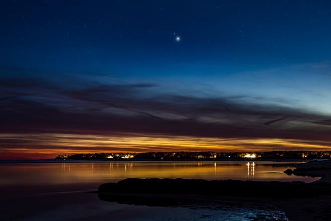 Dan Jentzen shared this picture he took of Jupiter (the brighter planet) and Saturn on Dec. 15, as they neared their closest approach on Dec. 21. This picture was taken in Cotuit, looking across to Poponesset, on Cape Cod, Massachusetts. [Contributed by Dan Jentzen]