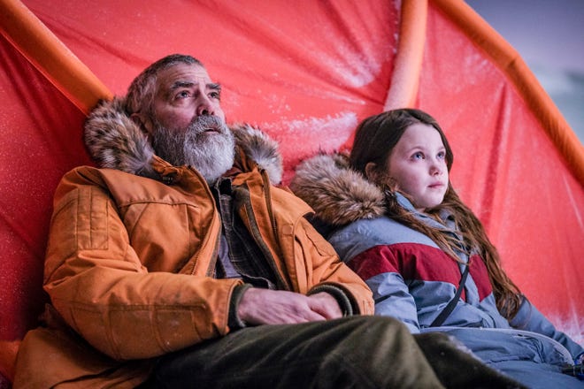 Augustine (George Clooney) and Iris (Caoilinn Springall) keep watching the skies. [Netflix]