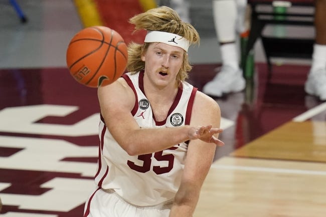 Oklahoma forward Brady Manek scored just two points in a recent loss to Texas Tech. He's averaged better than 21 points in games following ones in which he's scored five or less points. [AP Photo/Sue Ogrocki]