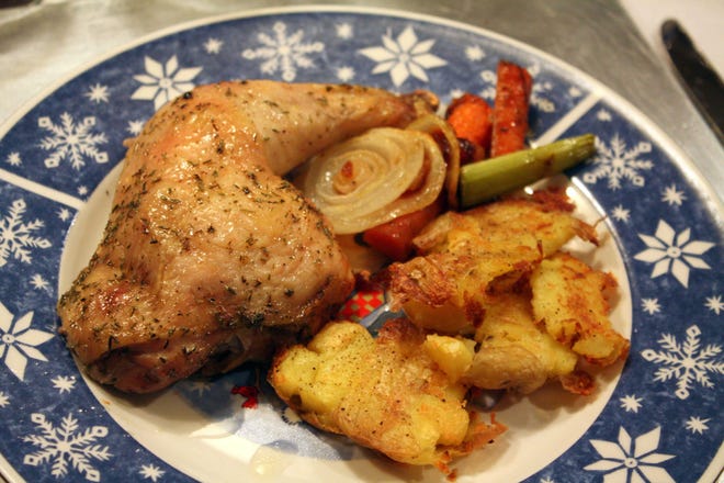 Roasted Rosemary Chicken and Smashed Roasted Potatoes with Rosemary Olive Oil Drizzle. [Laura Tolbert]