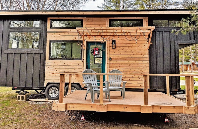 Enjoy serene lake views and all the comforts of home at the Hocking Hills Tiny Houses. [CR RAE]