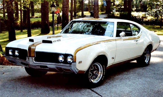 The 1969 Hurst Olds 442 is one of the more desirable muscle cars from the 1960s. Both featured 455-inch Rocket V8s with 390 horsepower. Only 515 were built in 1968 and 906 were assembled in 1969. This 1969 came only in white and gold, while the 1968 featured a black and silver motif. [Barrett-Jackson]