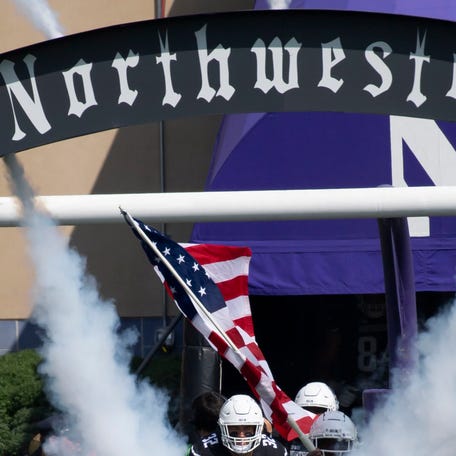 Sep 10, 2022; Evanston, Illinois, USA; The Northwestern Wildcats enter the field prior to the first quarter against the Duke Blue Devils at Ryan Field. Mandatory Credit: Patrick Gorski-USA TODAY Sports