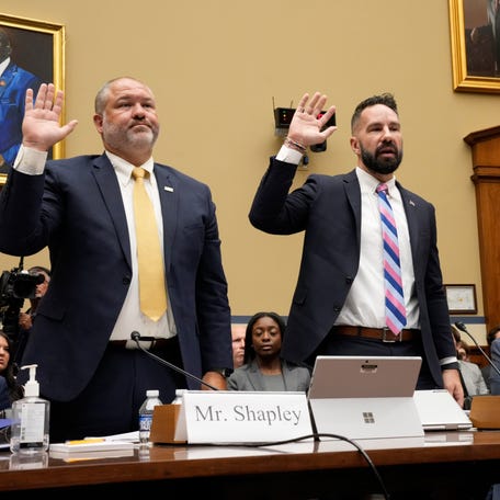 IRS Supervisory Special Agent Gary Shapley, left, and IRS Criminal Investigator Joseph Ziegler, are sworn in at a House Oversight Committee meeting on July 19, 2023 in Washington. Shapley alleges that the Justice Department interfered in the IRS investigation of Hunter Biden.