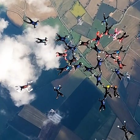 A team of 41 skydivers successfully completed the largest ever sequential formation dive in the United Kingdom.