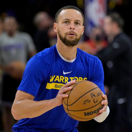 Stephen Curry warms up prior to a Golden State Warriors' playoff game against the Los Angeles Lakers on May 12, 2023.