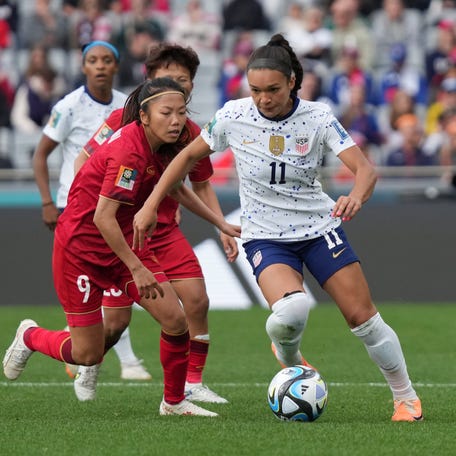 Forward Sophia Smith (11) moves the ball past Vietnam forward Huynh Nhu (9) during the U.S. Women's National Team's opener at the 2023 World Cup at Eden Park in New Zealand.