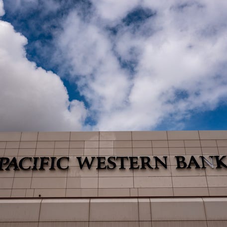 In an aerial view, a Pacific Western Bank sign is seen on May 4, 2023 in Los Angeles, California. Pacific Western Bank's stock plunged Thursday in the wake of other bank failures. (Photo by David McNew/Getty Images)