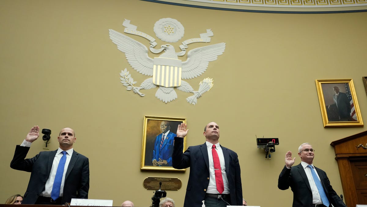 Ryan Graves, executive director of Americans for Safe Aerospace, David Grusch, former National Reconnaissance Officer Representative of Unidentified Anomalous Phenomena Task Force at the U.S. Department of Defense, and Retired Navy Commander David Fravor are sworn-in during a House Oversight Committee hearing titled Unidentified Anomalous Phenomena: Implications on National Security, Public Safety, and Government Transparency on Capitol Hill in Washington, DC. Several   witnesses are testifying about their experience with possible UFO encounters and discussion about a potential covert government program concerning debris from crashed, non-human origin spacecraft.