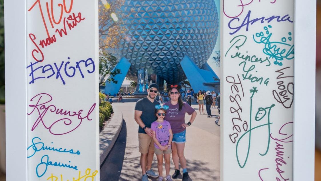 Heather Hans used the My Disney Experience app to find characters for autographs.