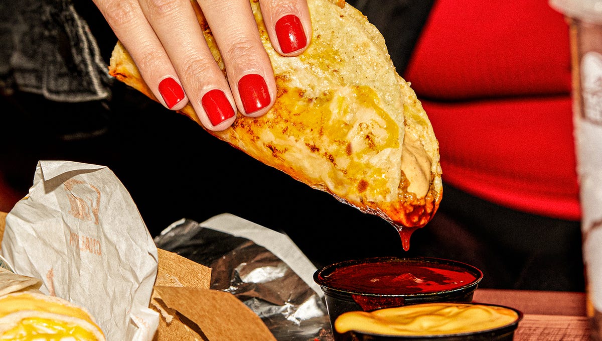 Taco Bell's newest limited-time menu item, the Grilled Cheese Dipping Taco hits Taco Bell's menu on Thursday, Aug. 3.