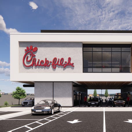 A rendering of a Chick-fil-A concept to be developed in the Atlanta area. The drive through will have four lanes and have a kitchen double the size of a standard Chick-fil-A restaurant.