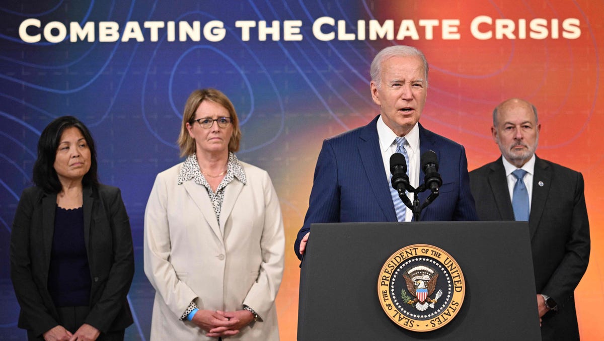 US President Joe Biden, joined by acting Labor Secretary Julie Su, FEMA Administrator Deanne Criswell, and National Oceanic and Atmospheric Administration (NOAA) Administrator Dr. Rick Spinrad, speaks during a briefing on extreme heat conditions, in the South Court Auditorium of the Eisenhower Executive Office Building, next to the White House, in Washington, DC, on July 27, 2023.