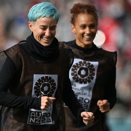 USA's Megan Rapinoe and Lynn Williams warm up during their match against Vietnam at Eden Park in Auckland, New Zealand.