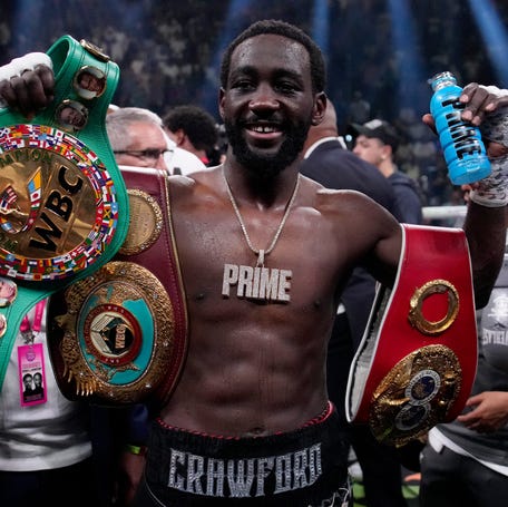 Terence Crawford celebrates after stopping Errol Spence Jr.