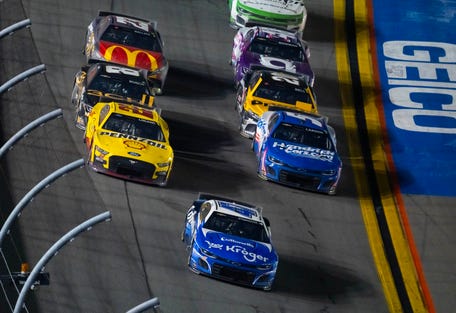 Ricky Stenhouse Jr., front, Joey Logano (22), Kyle Larson (5), Kyle Busch (8), and Christopher Bell (20) have all clinched playoff berths, while Bubba Wallace (23) and Alex Bowman (48) are seeking to claim one of the four remaining spots.