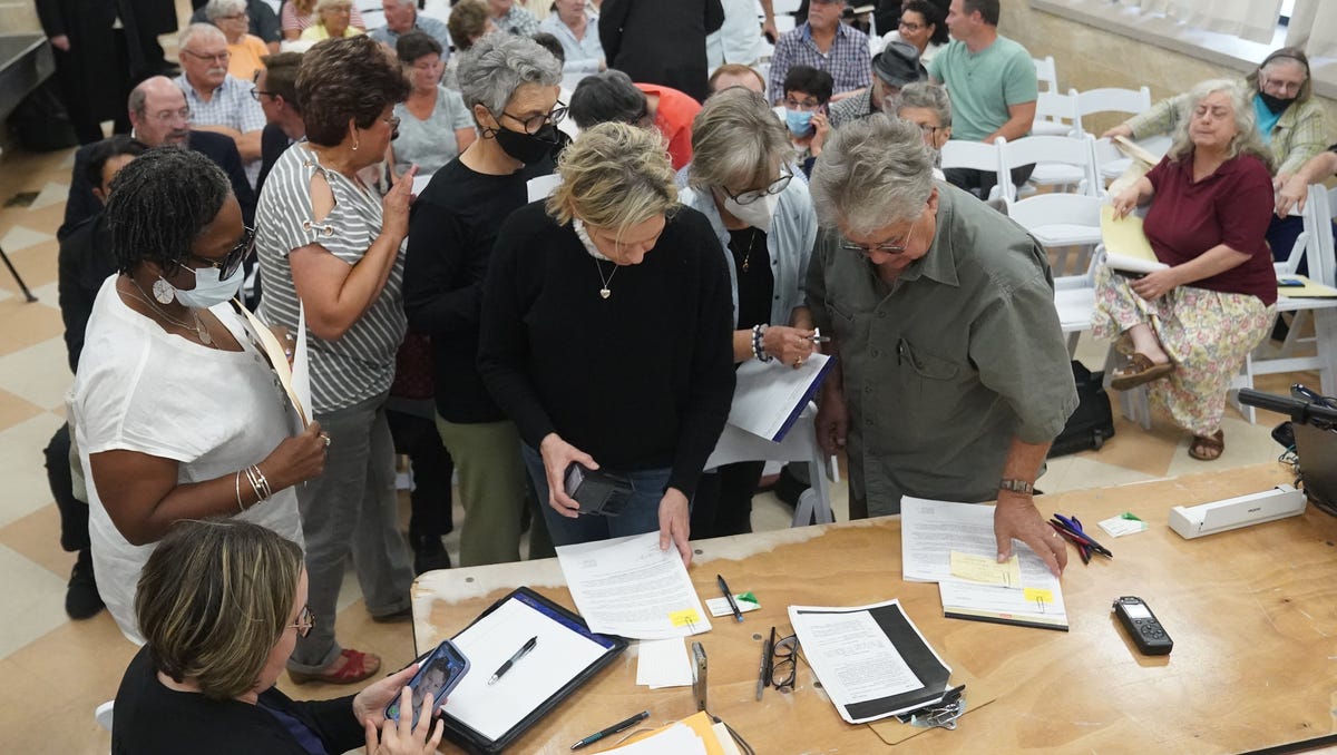 Residents sign up to speak at a public hearing on a petition to create a village within the borders of the towns of Thompson and Fallsburg at Viznitz Institutions synagogue in Kiamesha Lake on Thursday, August 3, 2023.