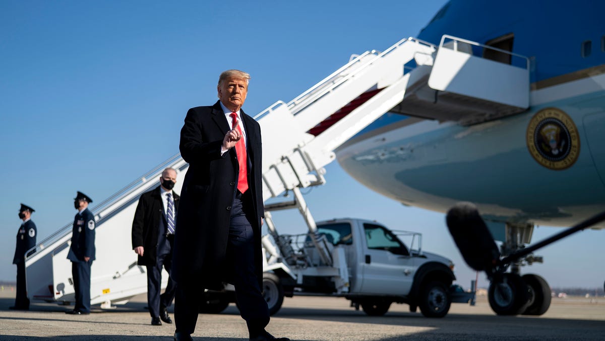 FILE — Then-President Donald Trump with reporters before boarding Air Force One at Joint Base Andrews, Md., Jan. 12, 2021. Trump is the target of four separate criminal indictments, but the prosecutions could drag on for months or even years.