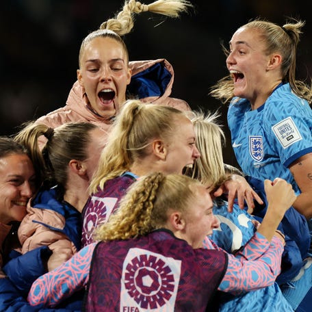England players celebrate a goal in the semifinals against Australia.