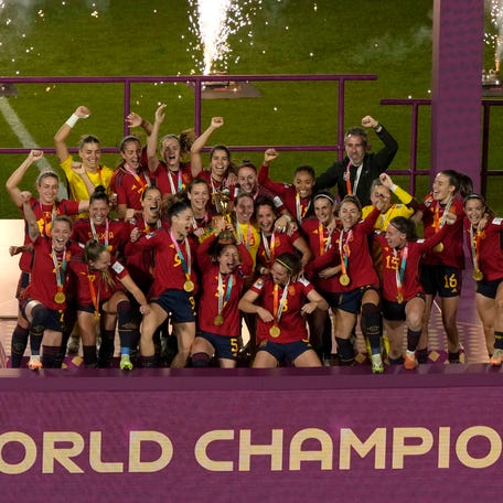 Team Spain celebrates after beating England in the final an dwinning the 2023 World Cup in Sydney, Australia.