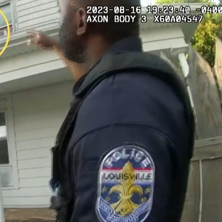 Police released body camera video showing officers rescuing a woman chained to a bedroom floor in Louisville, Kentucky.