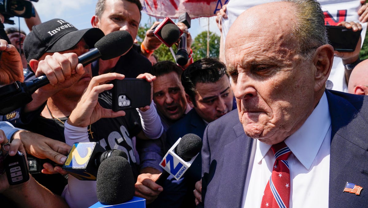 August 23, 2023: Rudy Giuliani speaks outside the Fulton County jail, in Atlanta. Giuliani has surrendered to authorities in Georgia to face an indictment alleging he acted as former President Donald Trump's chief co-conspirator in a plot to subvert the 2020 election.