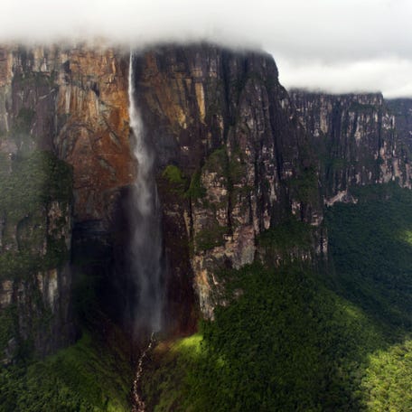 Aerial view taken on December 16, 2014 of the Angel Falls (Salto Angel), the world's highest waterfall, with a height of 979 meters (3,212 feet), located in Canaima National Park, Bolivar State, Gran Sabana Region, South-Eastern Venezuela.