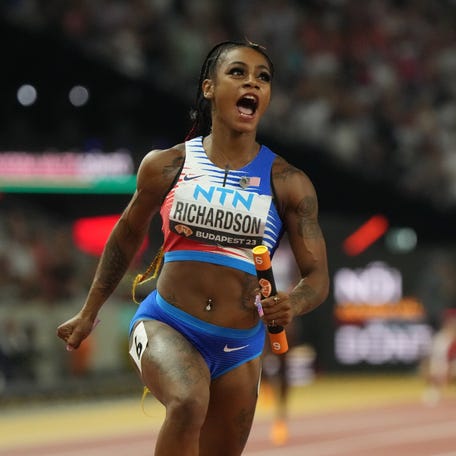 Sha'Carri Richardson reacts after the women's 4x100m relay final during the 2023 World Athletics Championships.