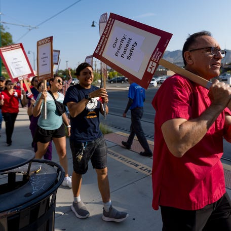 Nurses stage an informational picket outside the Hospitals of Providence Memorial Campus Aug. 22, 2023, as they push for new labor contracts covering about 750 nurses.