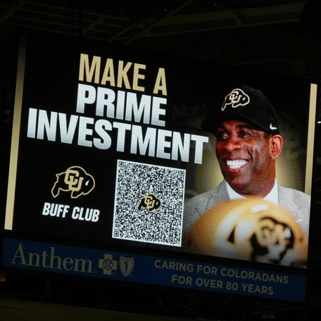 Dec 15, 2022; Boulder, Colorado, USA; General view of a video billboard signage featuring Colorado Buffaloes head coach Deion Sanders during first half against the North Alabama Lions at the CU Events Center. Mandatory Credit: Ron Chenoy-USA TODAY Sports