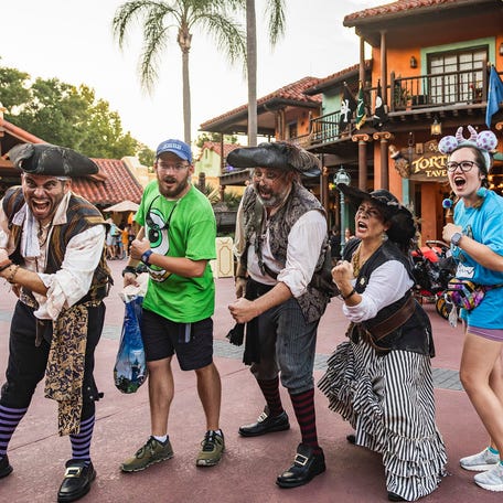 While there are no live pirates inside Pirates of the Caribbean this year, guests can interact with pirates outside the attraction.