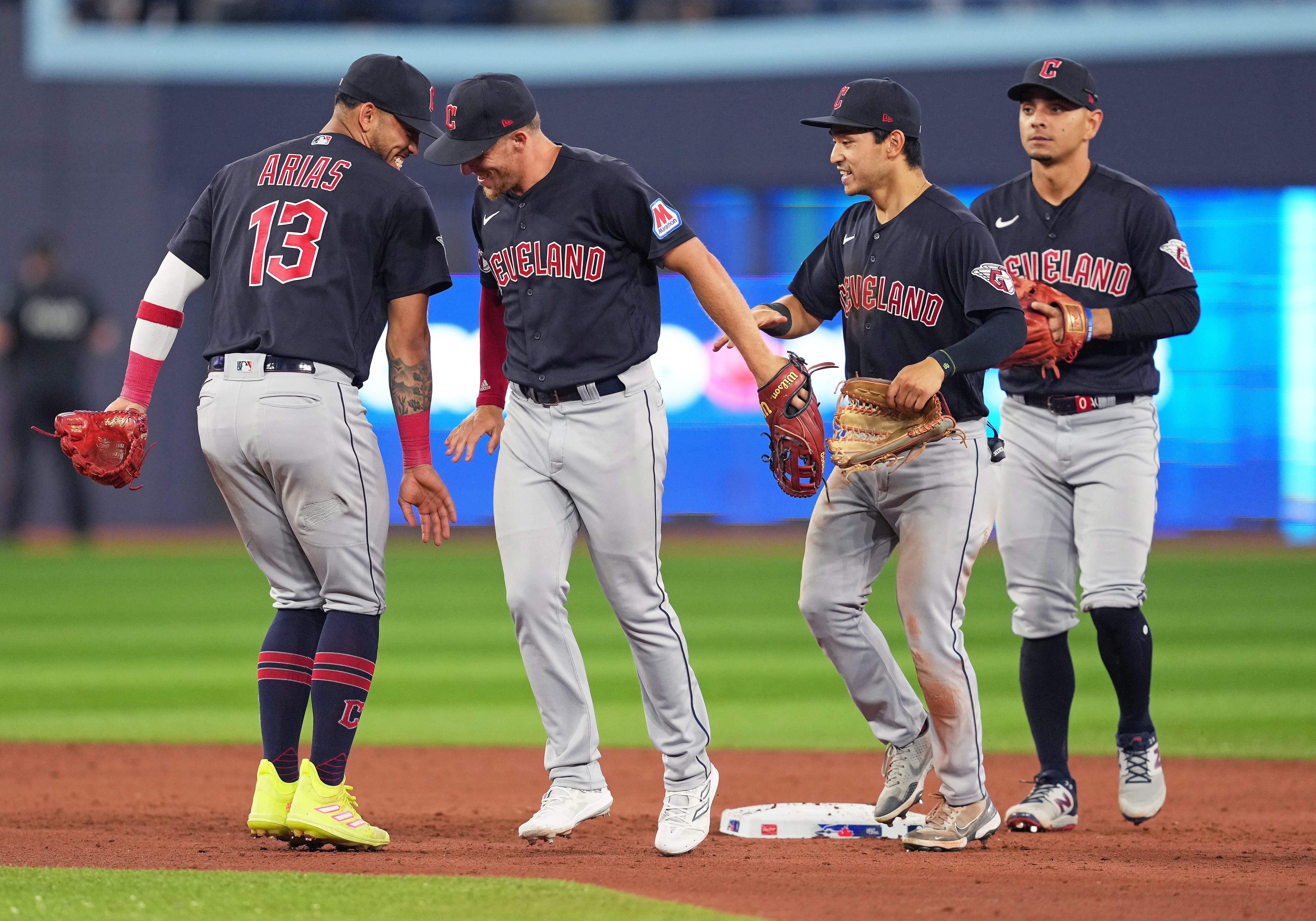 Guardians players celebrate a win over the Blue Jays.