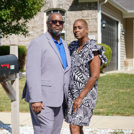Cedric and RaKesha Hil are photographed in front of a home they hoped to purchase back in 2021, on Sunday, Sept. 3, 2023, in Indianapolis. The couple found that they were outbid by a cash-only offer from real estate investment company Tricon Residential, a Canadian real estate company which is one of Indianapolis' largest corporate residential real estate owners.