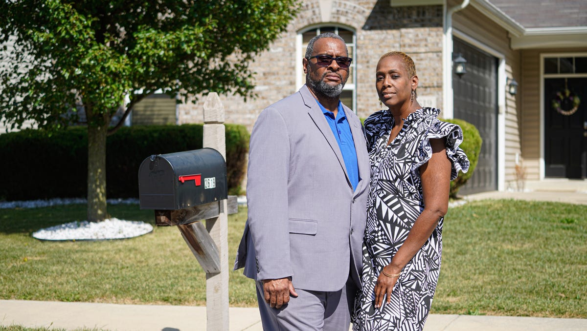 Cedric and RaKesha Hil are photographed in front of a home they hoped to purchase back in 2021, on Sunday, Sept. 3, 2023, in Indianapolis. The couple found that they were outbid by a cash-only offer from real estate investment company Tricon Residential, a Canadian real estate company which is one of Indianapolis' largest corporate residential real estate owners.
