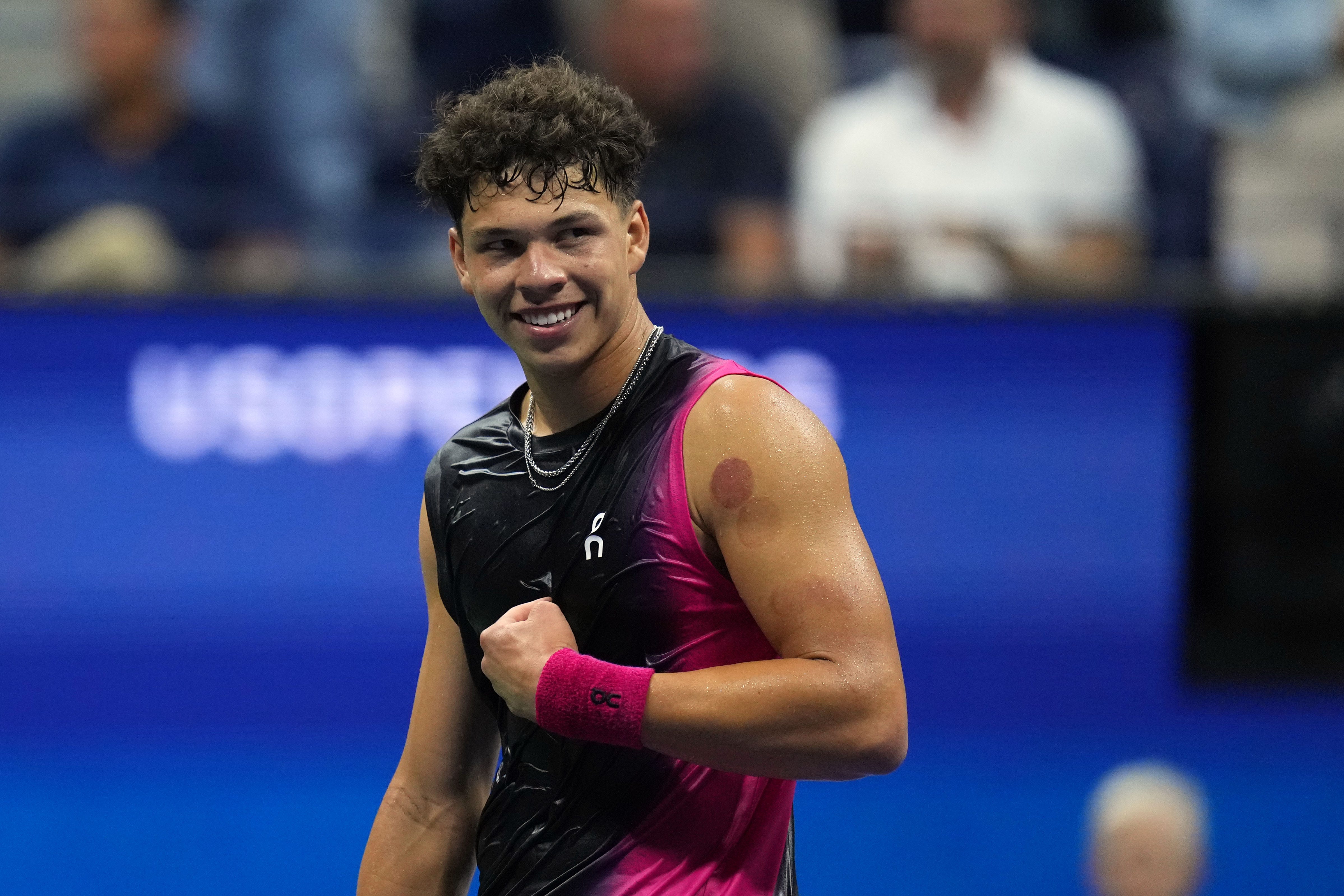 Ben Shelton celebrates after winning the third set against Frances Tiafoe.