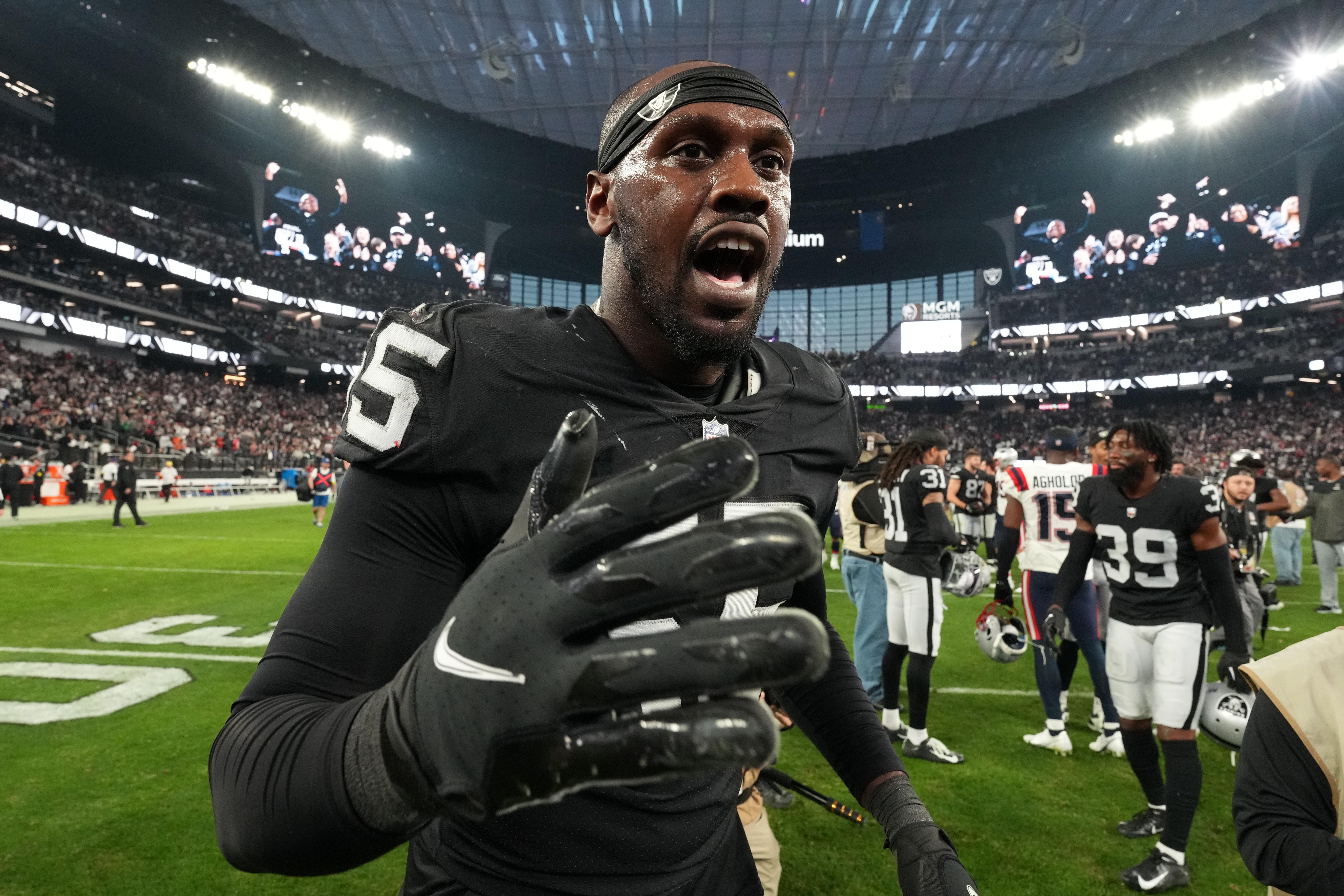 Las Vegas Raiders defensive end Chandler Jones (55) celebrates after the game against the New England Patriots at Allegiant Stadium.