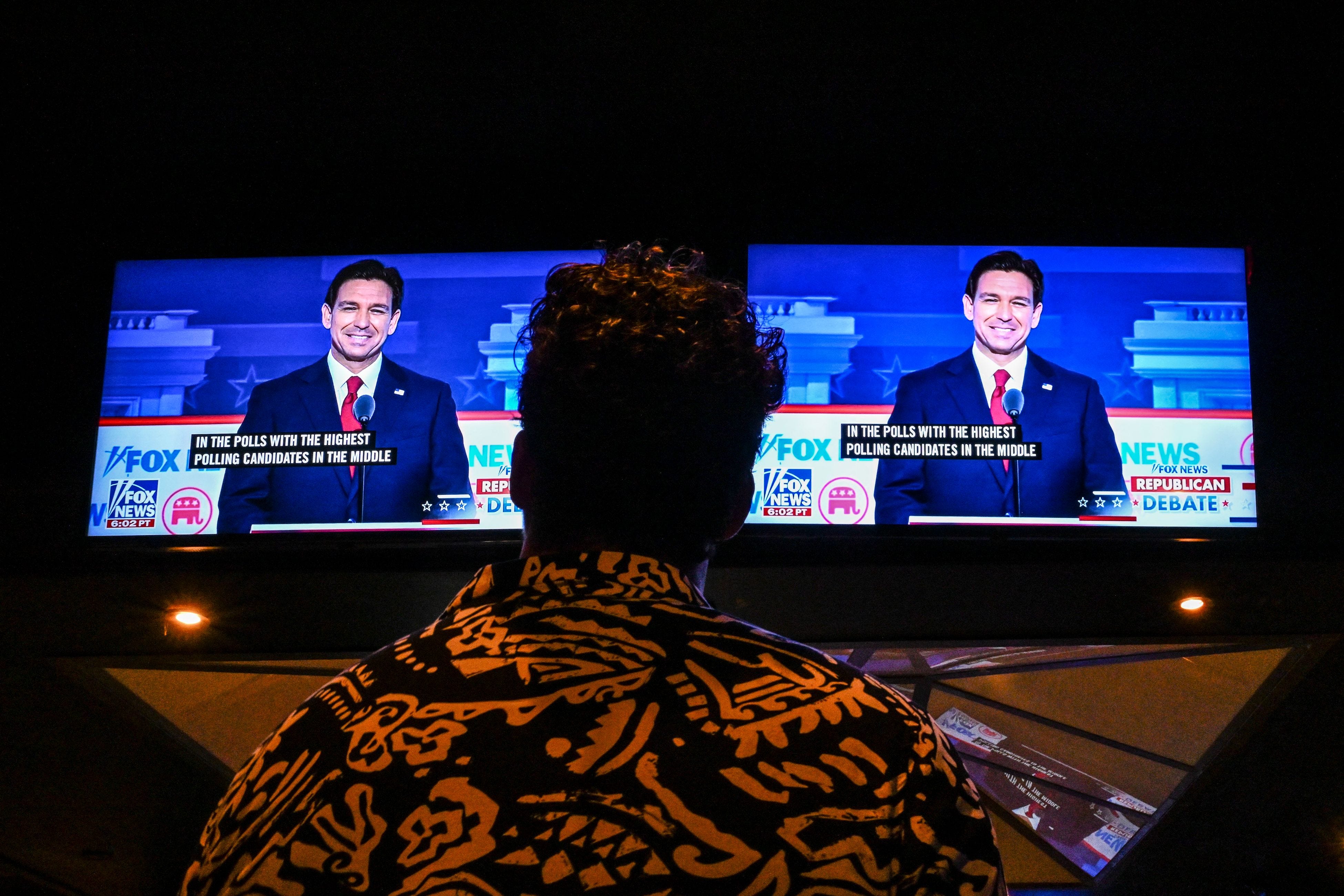 A member of the Atlanta Young Republicans attends a watch party of the first Republican Presidential primary debate at a bar in Atlanta, Georgia on August 23, 2023. Judging by applause, Vivek Ramaswamy won. Nikki Haley was a pleasant surprise, and many of them didn't seem to miss Donald Trump. (Photo by CHANDAN KHANNA/AFP via Getty Images)