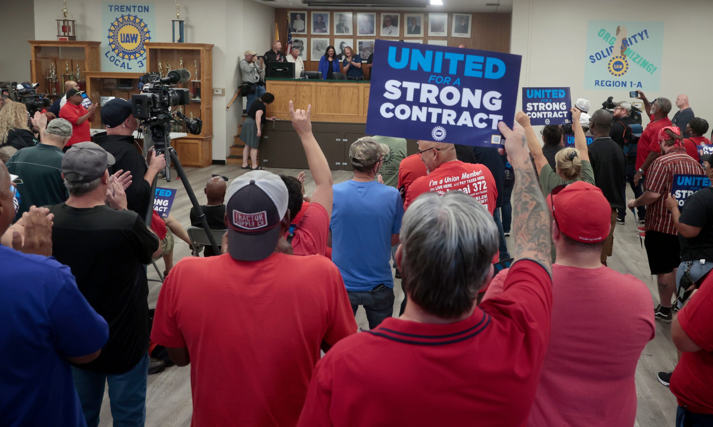 Members from UAW Local 372 who work at the Stellantis Trenton Engine Plant in Trenton listen to speakers inside the union hall before they marched across the street to the plant to rally and protest on Thursday, September 7, 2023.