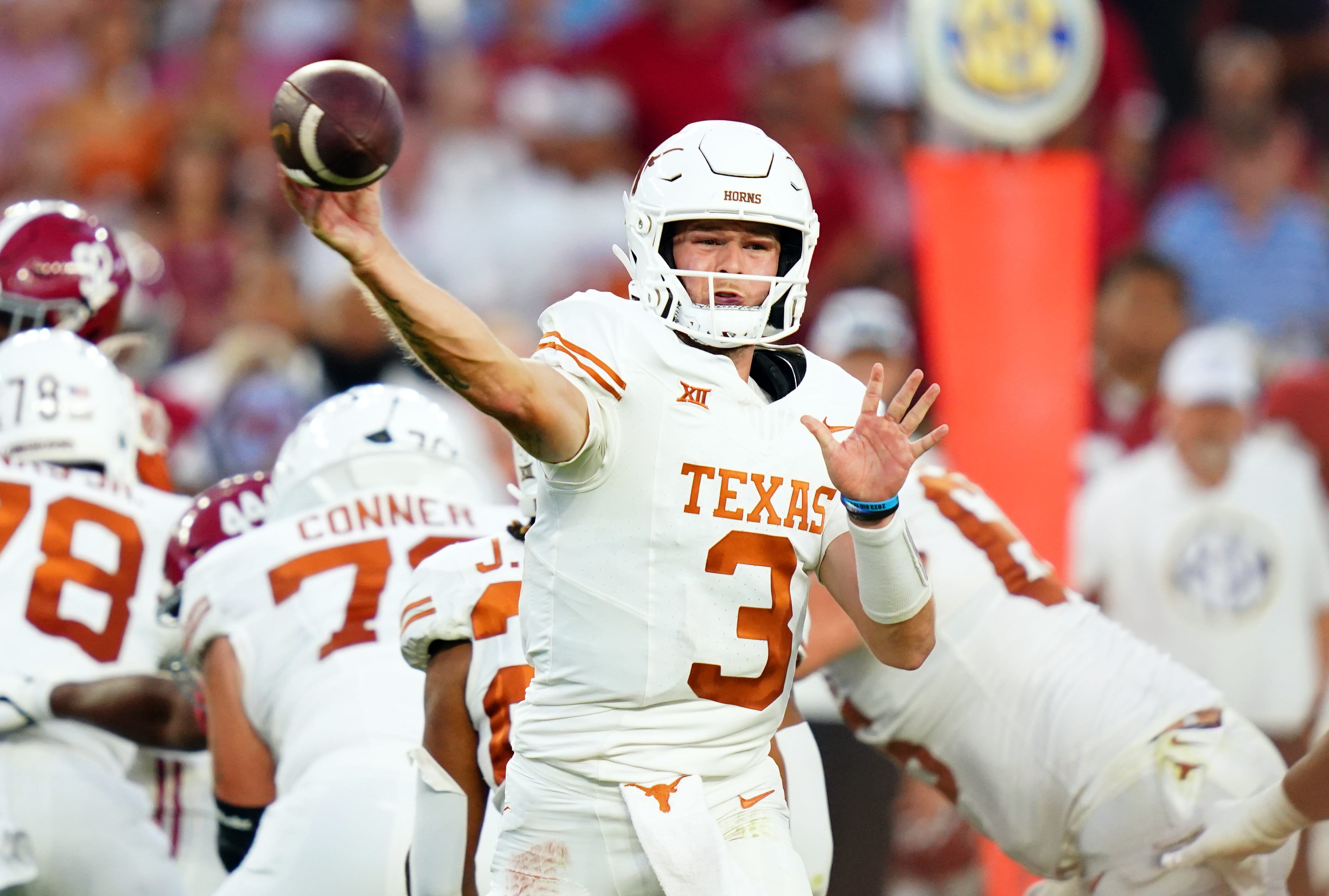 Texas Longhorns quarterback Quinn Ewers (3) passing against the Alabama Crimson Tide during the second quarter at Bryant-Denny Stadium on Sept. 9, 2023.