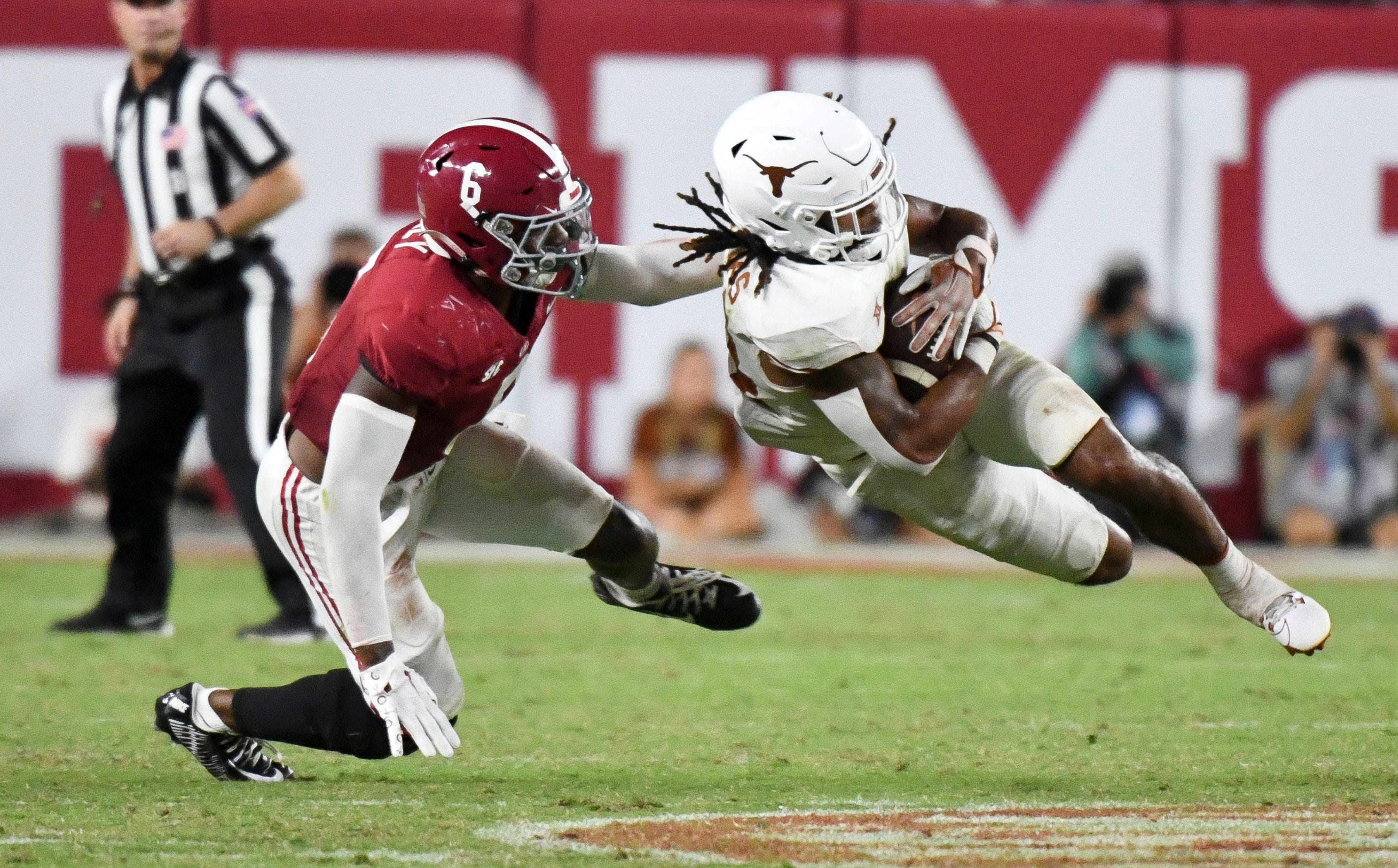 Alabama defensive back Jaylen Key tackles Texas running back Jonathon Brooks (24) during the Longhorns' 34-24 win.