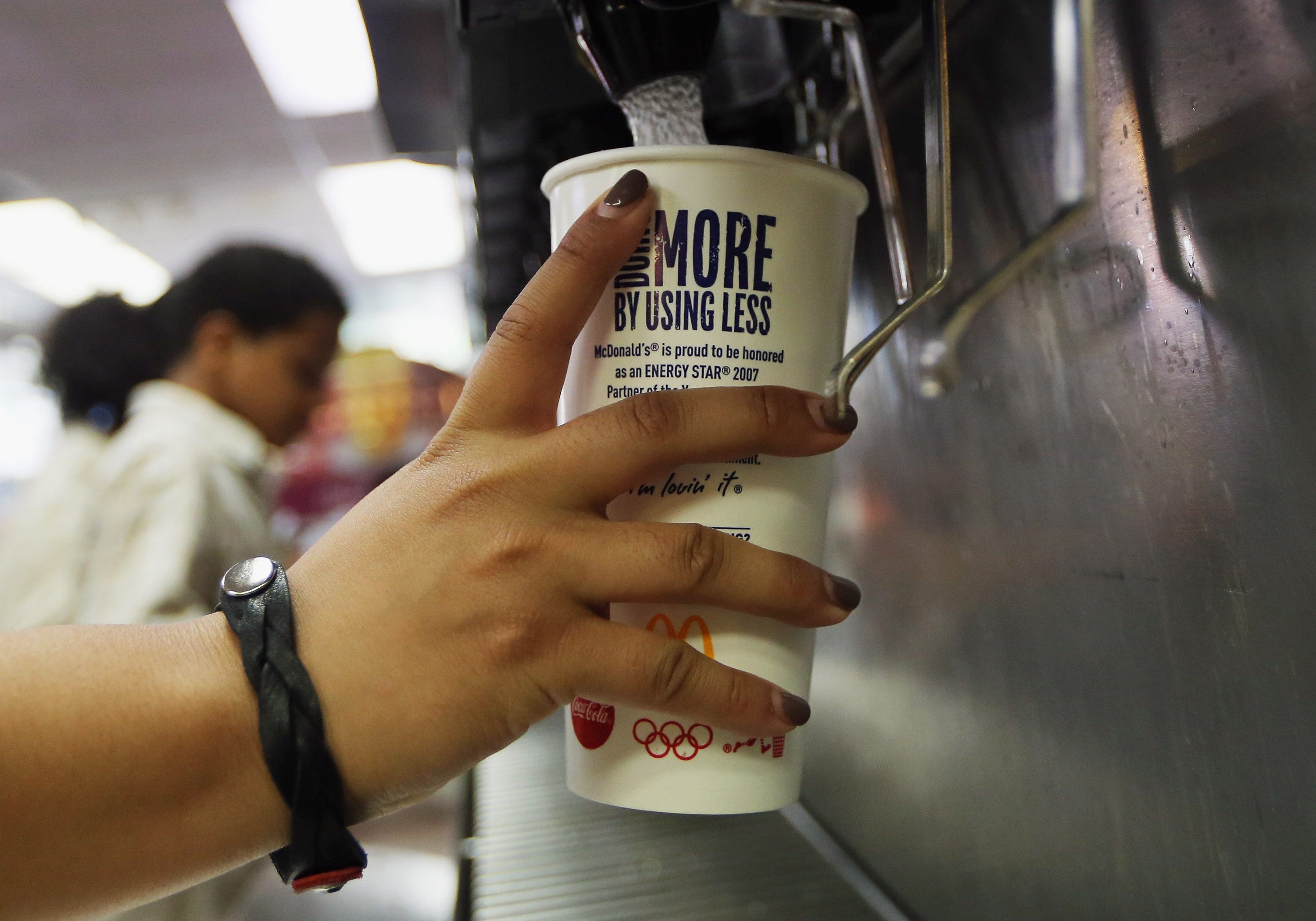 NEW YORK, NY - SEPTEMBER 13: A customer fills a 21 ounce cup with soda at a 'McDonalds' on September 13, 2012 in New York City. In an effort to combat obesity, the New York City Board of Health voted to ban the sale of large sugary drinks. The controversial measure bars the sale of sugar drinks larger than 16 ounces at restaurants and concessions. (Photo by Mario Tama/Getty Images)