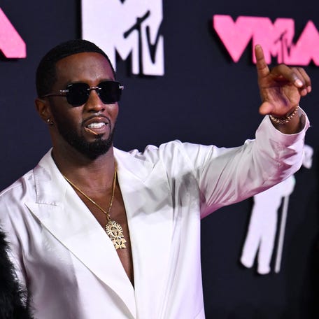 Sean "Diddy" Combs (R) arrives for the 2023 MTV Video Music Awards in Newark, New Jersey, on Sept. 12, 2023.