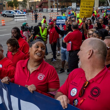 UAW Director Laura Dickerson marches alongside United Auto Workers members during a rally in Detroit on Friday, Sept. 15, 2023.