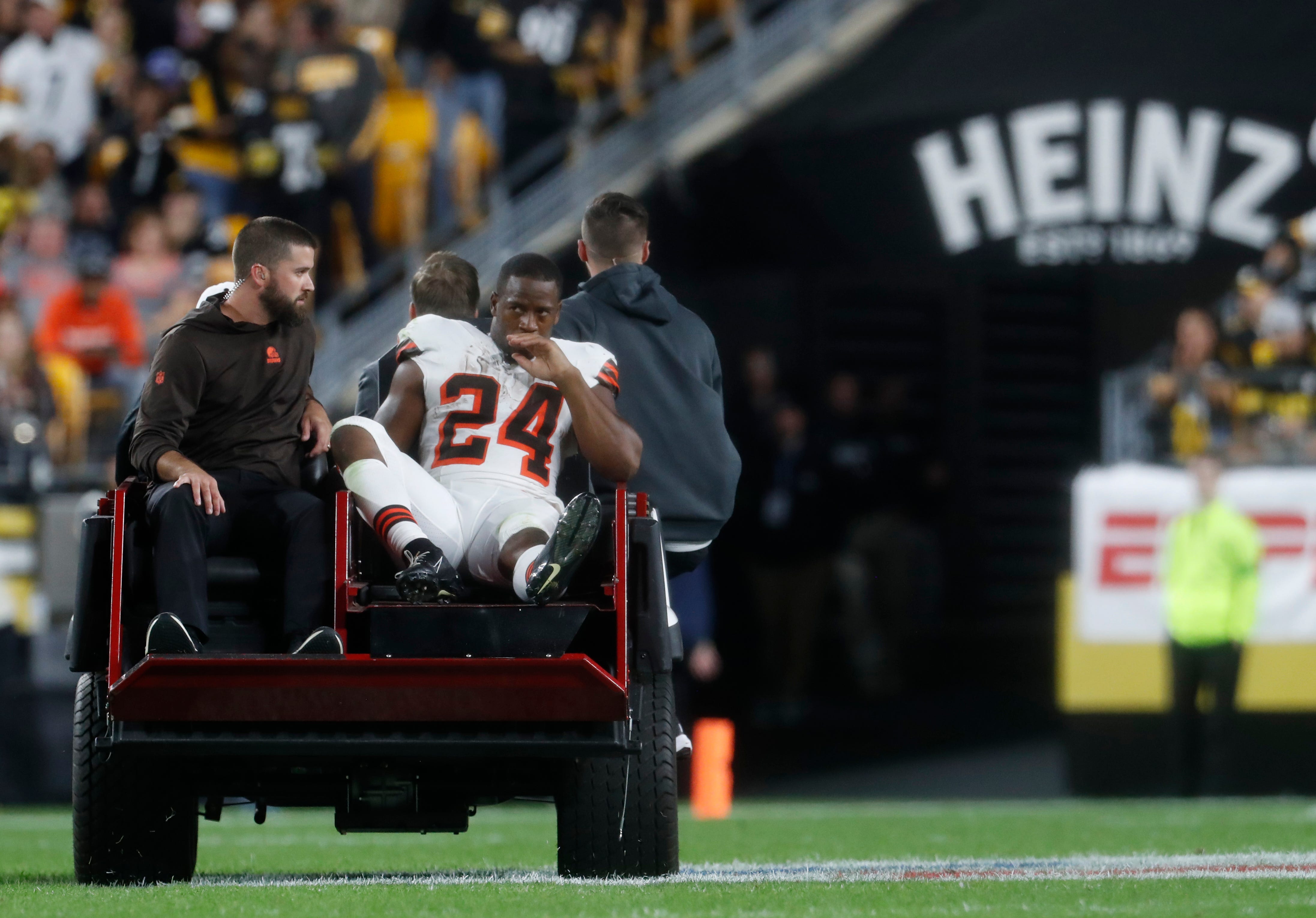 Sep 18, 2023; Pittsburgh, Pennsylvania, USA; Cleveland Browns running back Nick Chubb (24) is taken from the field on a cart after suffering an apparent injury against the Pittsburgh Steelers during the second quarter at Acrisure Stadium. Mandatory Credit: Charles LeClaire-USA TODAY Sports