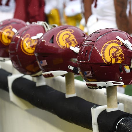 Sep 18, 2021; Pullman, Washington, USA; USC Trojans helmets sit during a game against the Washington State Cougars in the first half at Gesa Field at Martin Stadium.