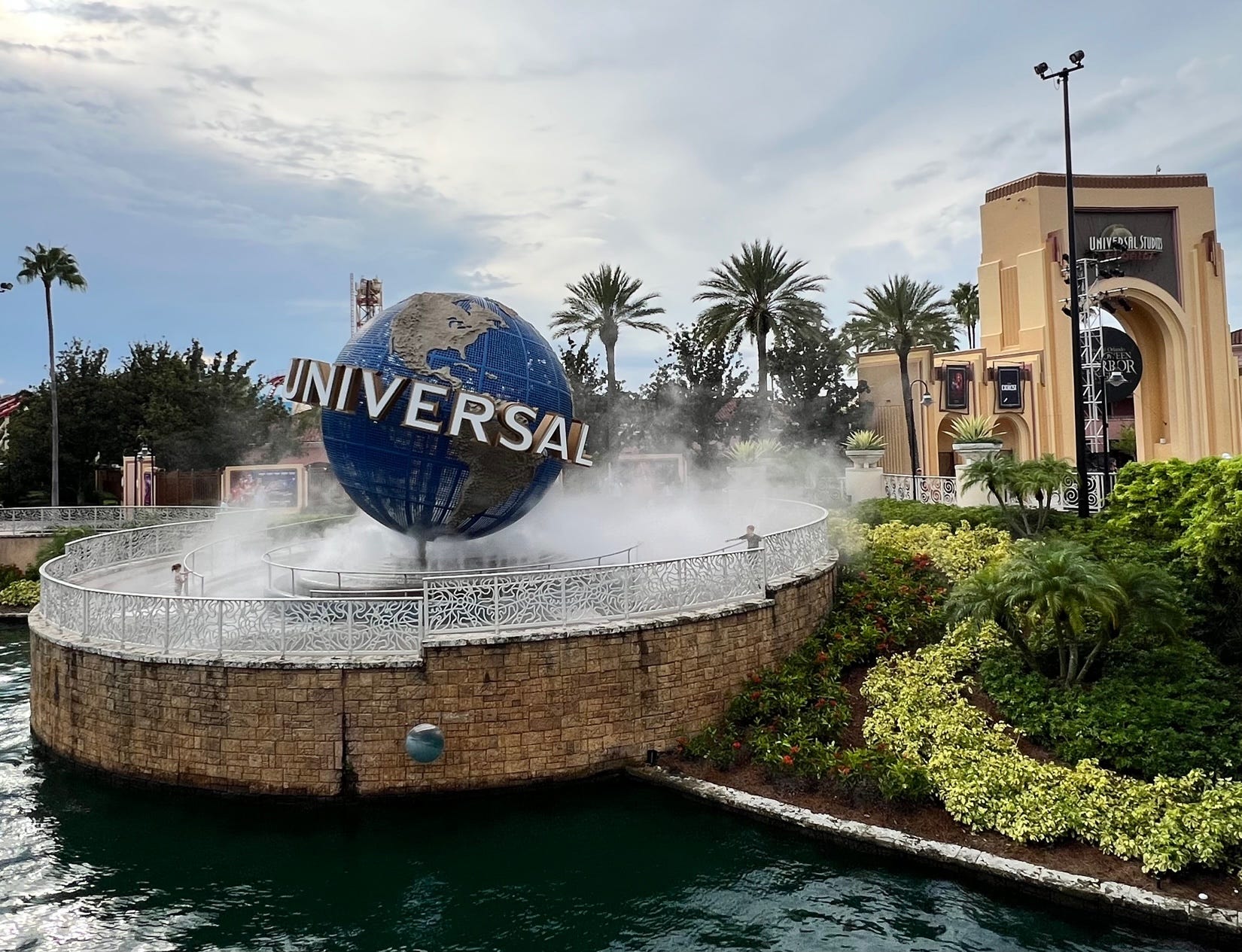 Mist rises up around Universal Orlando Resort's iconic globe.