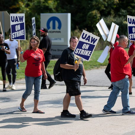 UAW Local 1248 members walk the picket line outside of a Stellantis plant in Romulus on Friday, Sept. 22, 2023.