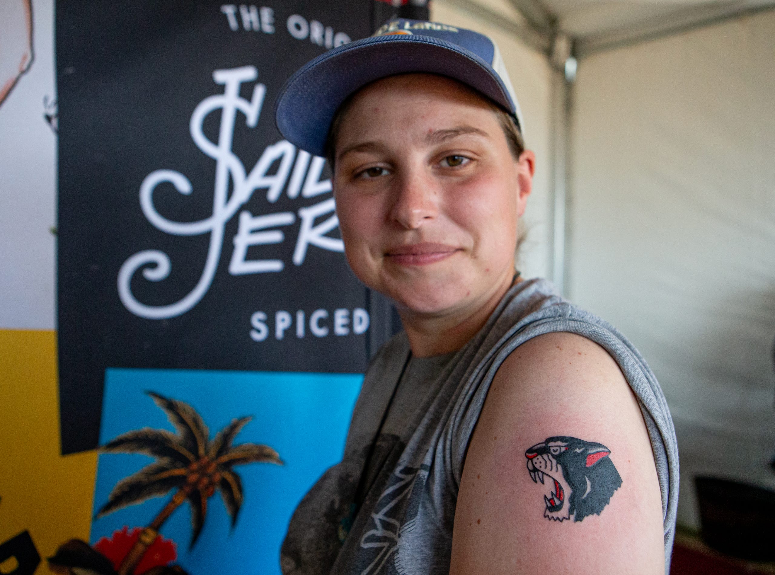 Chef Heske smiles after receiving her first tattoo from artist Christopher Waugh at the Louder Than Life music festival on Friday, Sept. 22, 2023 JEFF FAUGHENDER/COURIER JOURNAL AND USA TODAY NETWORK
